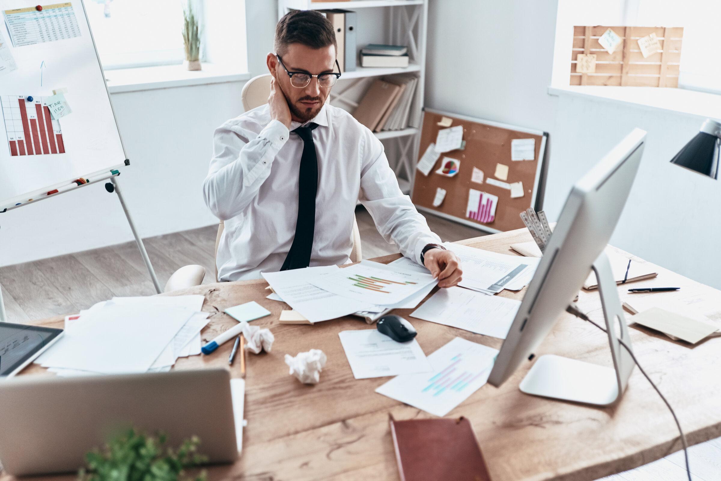 Entrepreneur working late, dealing with business challenges